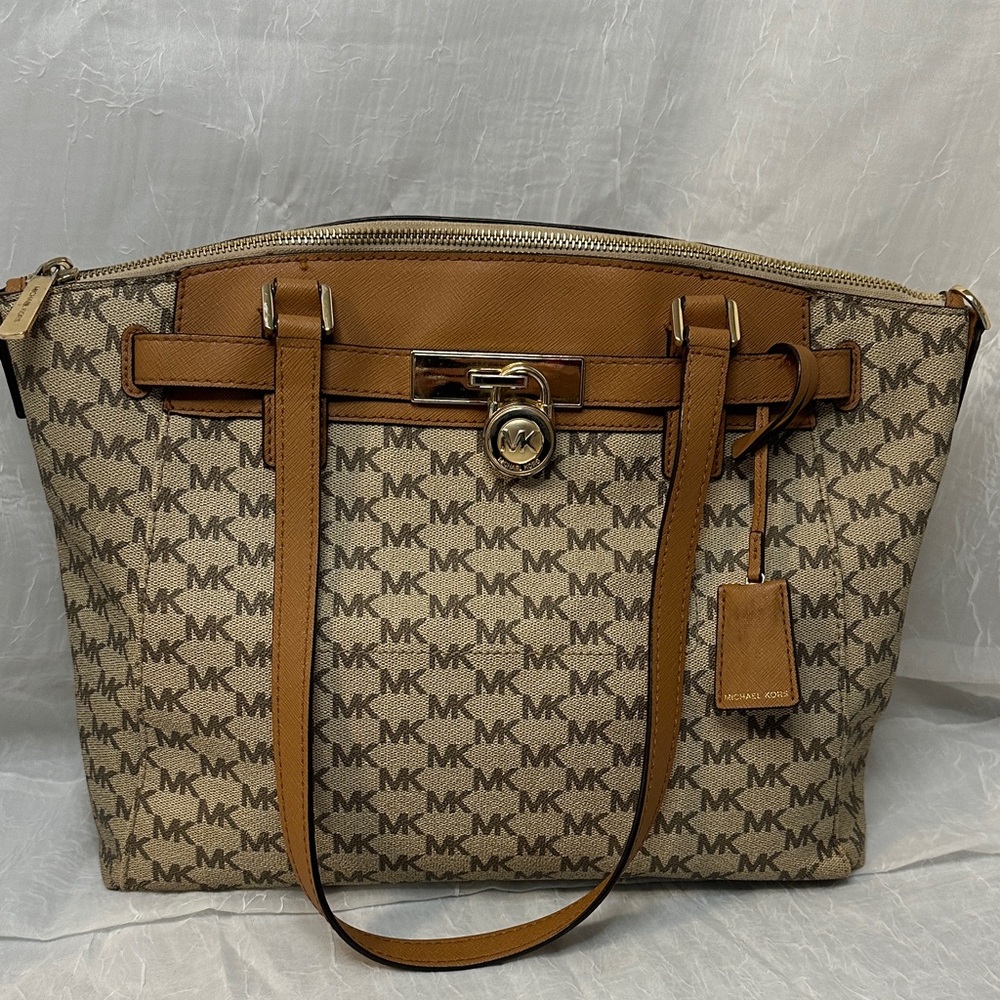 Michael Kors Tan and Brown Monogram shoulder bag with lock and key